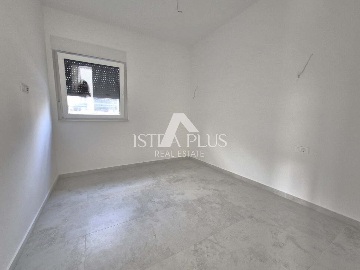 Istria, zona Parenzo a 2 km dal mare - Appartamento al piano terra 88m2 con giardino - NUOVA COSTRUZIONE