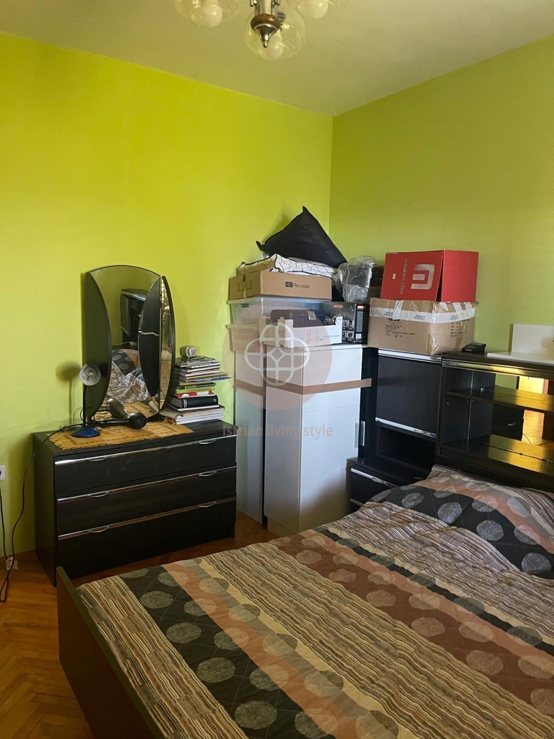 Casa residenziale con 2 unità abitative e ulteriore terreno edificabile in posizione soleggiata