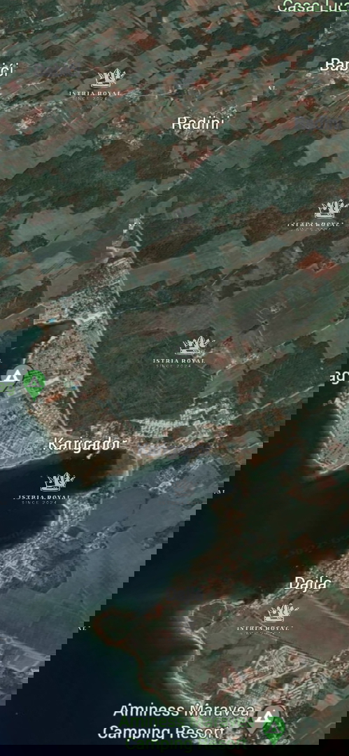 Novigrad, Karigador, vendita di terreno edificabile 7808m2, costruzione di appartamenti, ville per vacanze, 300m dal mare.