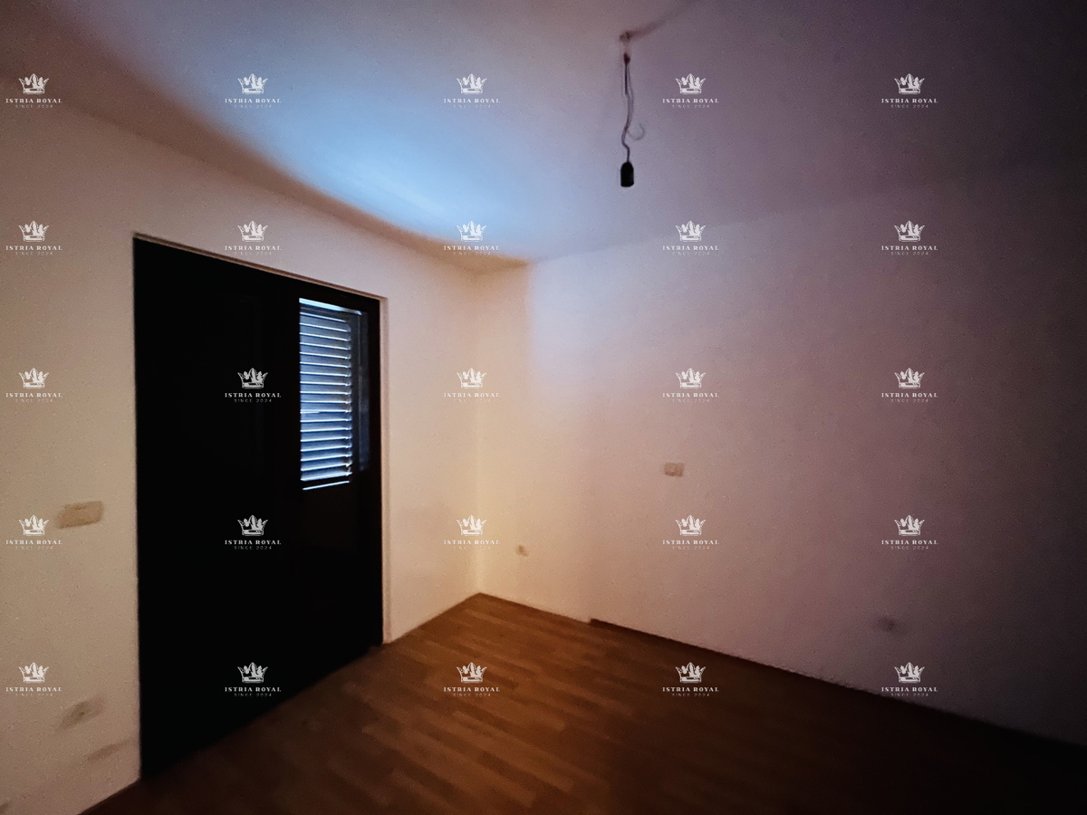 Istria, Bašanija, appartamento 2 camere da letto + soggiorno con angolo cottura, 63 m2, due terrazze, giardino 43 m2, zona tranquilla del quartiere, parcheggio