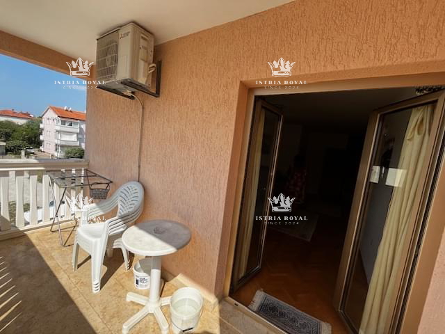 Istra, Medulin, centro, vendita di una casa con quattro appartamenti, investimento turistico, vicinanza al mare.