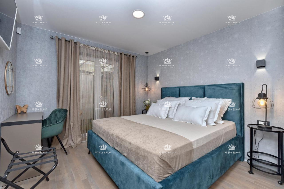 Istra, Pula, Pješčana uvala, vendita di un appartamento di lusso con giardino, orto, a 150m dal mare, nuova costruzione, investimento.