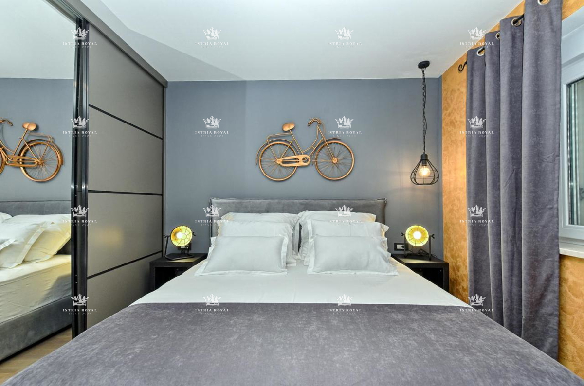 Istra, Pula, Pješčana uvala, vendita di un appartamento di lusso con giardino, orto, a 150m dal mare, nuova costruzione, investimento.