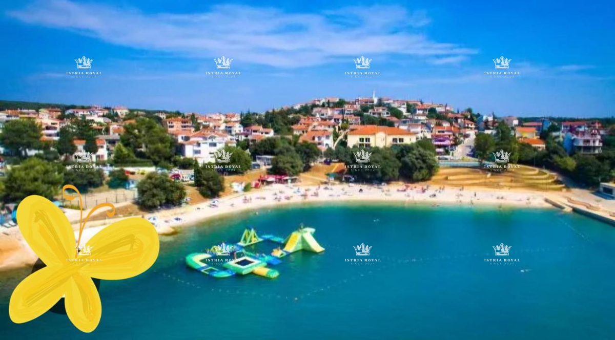 Istra, Pula, Pješčana uvala, vendita di un appartamento di lusso con giardino, orto, a 150m dal mare, nuova costruzione, investimento.