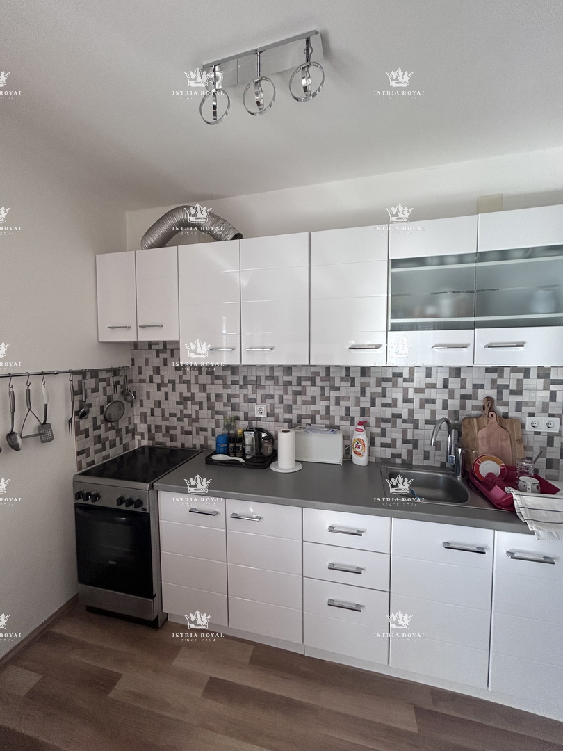 Istria, Brtonigla, 2 camere da letto + soggiorno, appartamento 84m2, nuova costruzione, terrazza, due posti auto, cortile 200m2