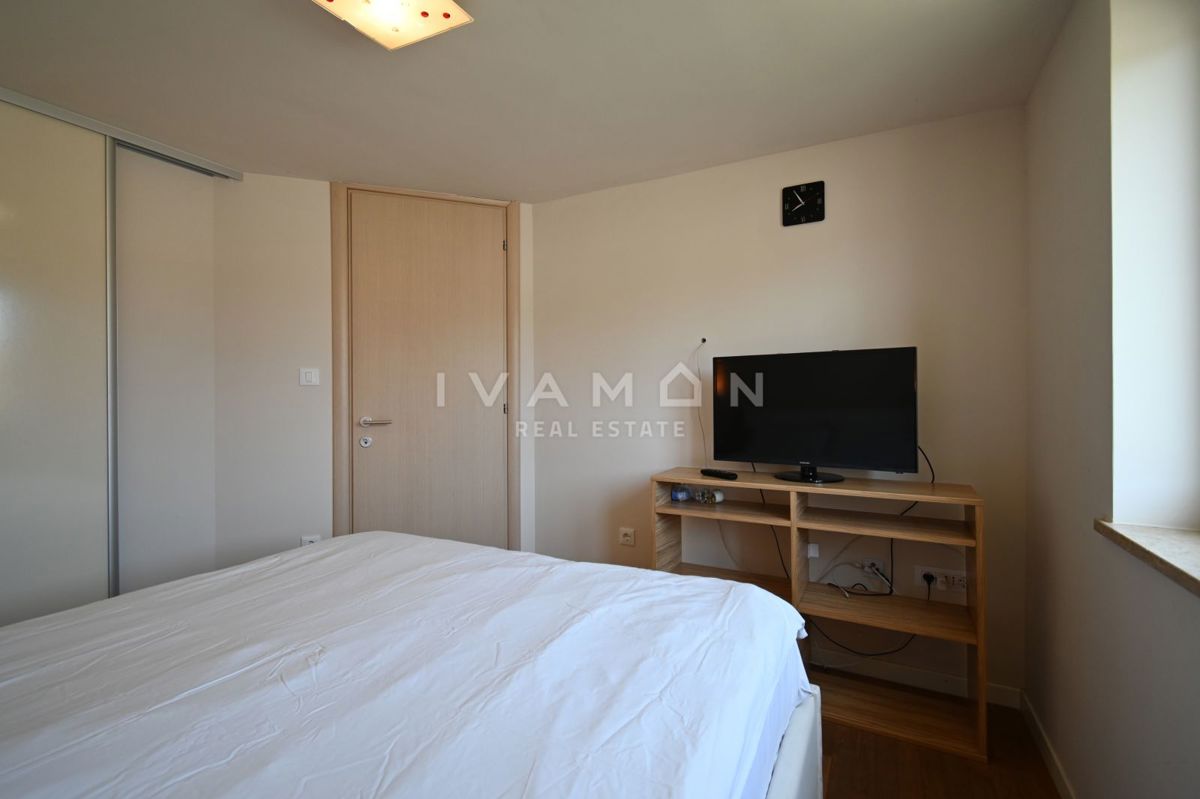 Bilocale in palazzina con piscina