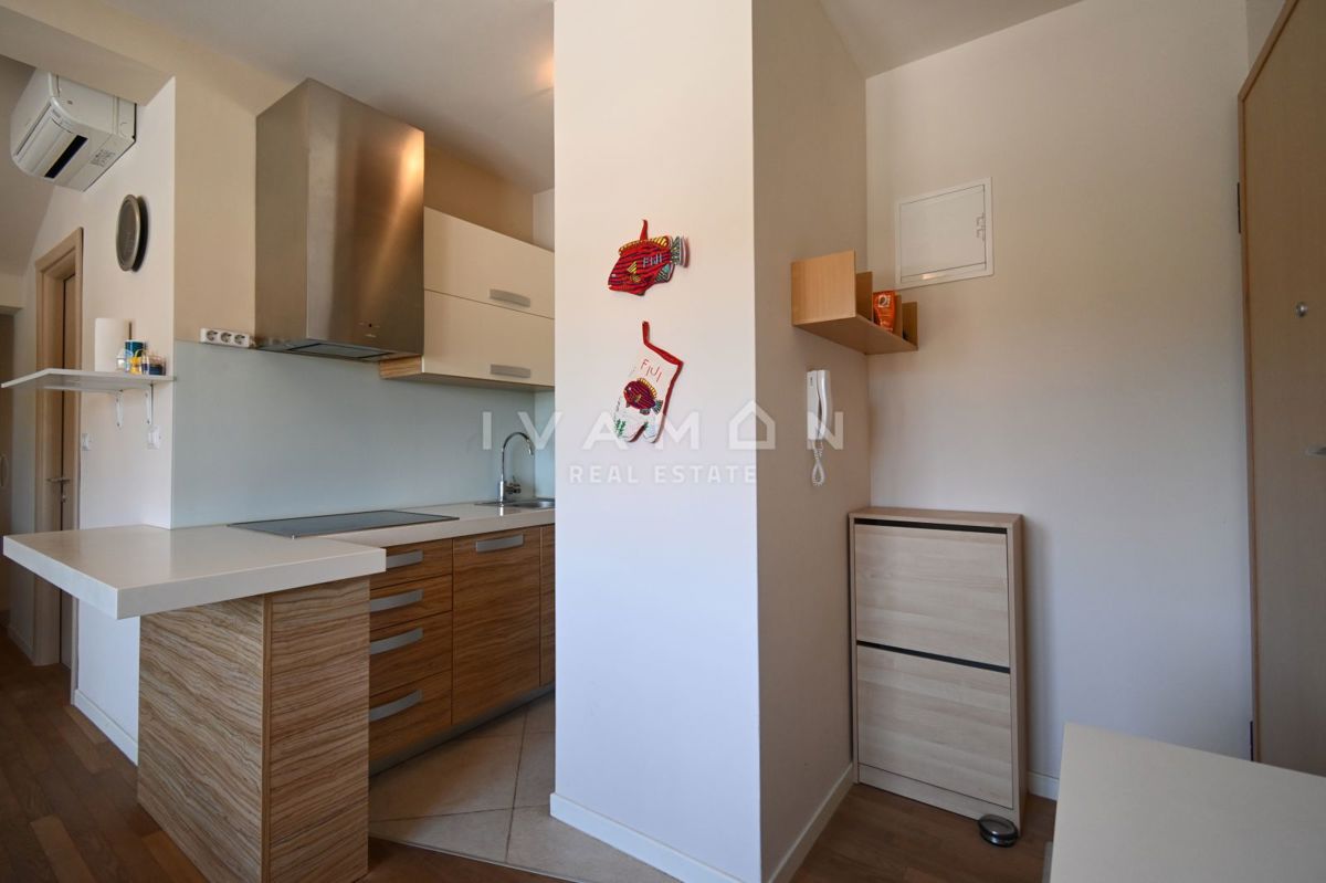 Bilocale in palazzina con piscina