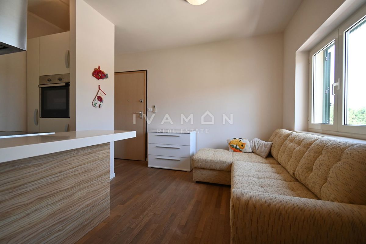 Bilocale in palazzina con piscina