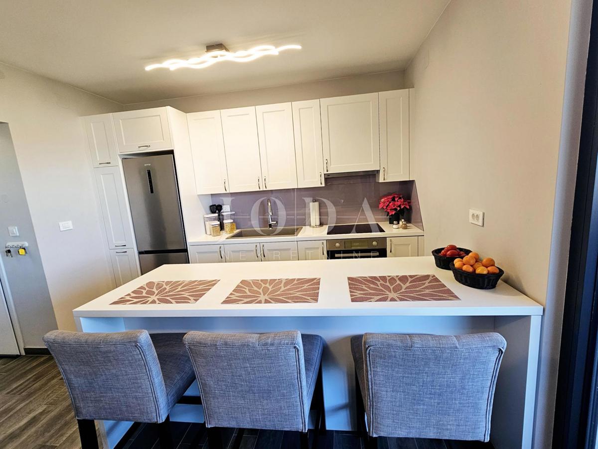 Bilocale funzionale con terrazza coperta