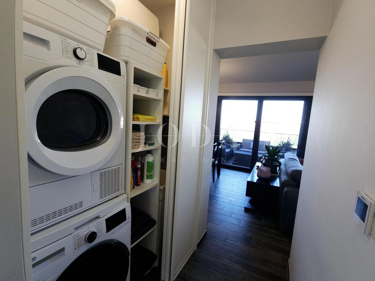 Bilocale funzionale con terrazza coperta