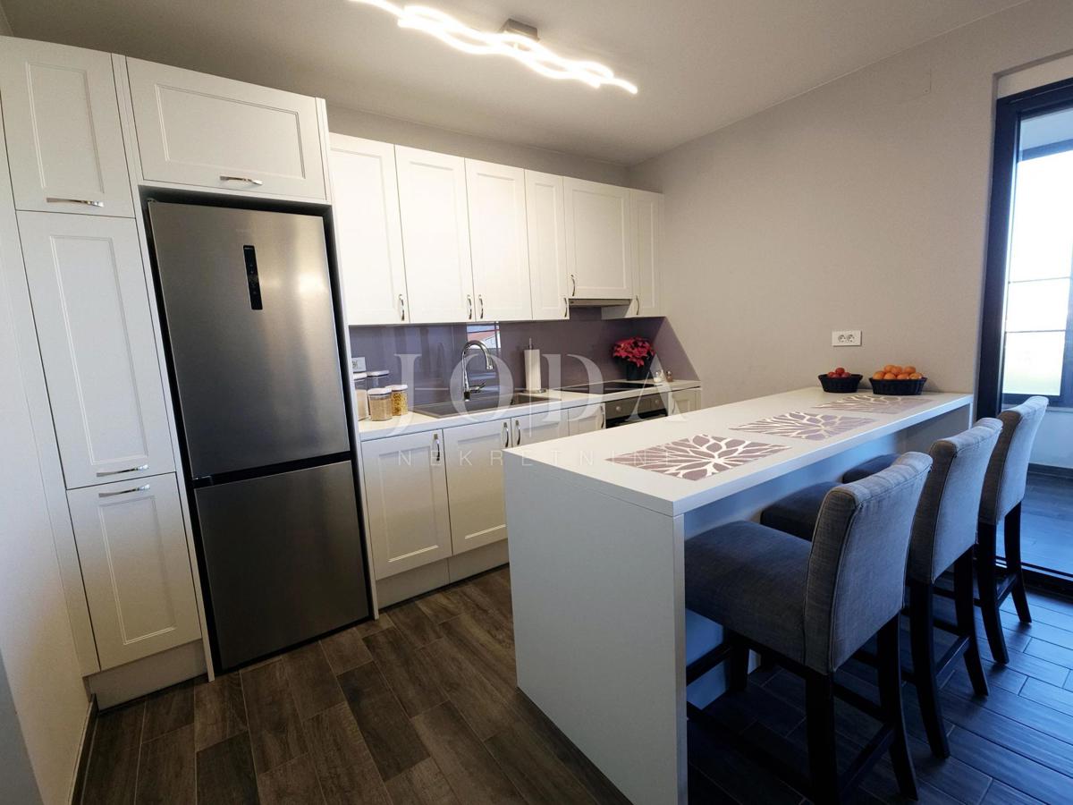 Bilocale funzionale con terrazza coperta