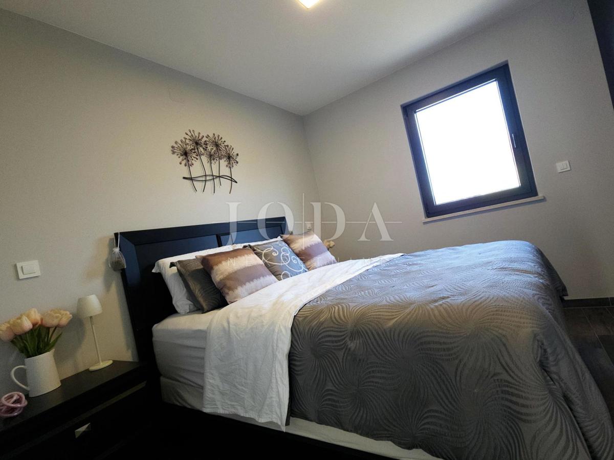 Bilocale funzionale con terrazza coperta