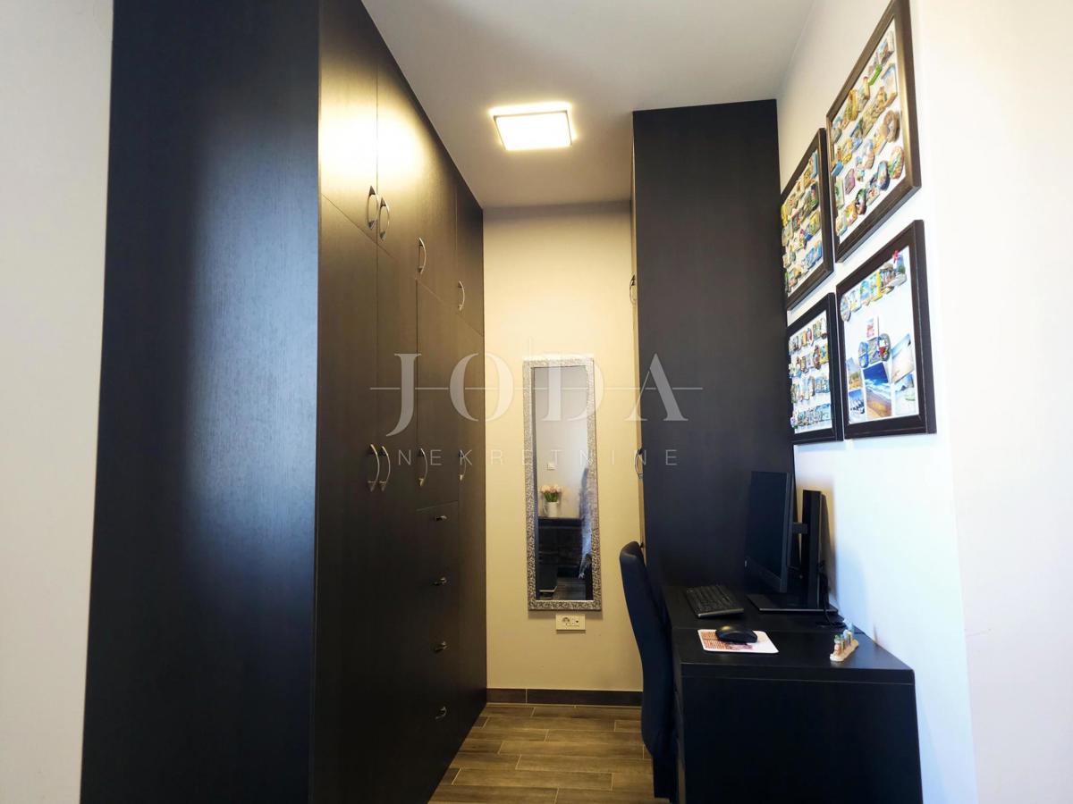 Bilocale funzionale con terrazza coperta