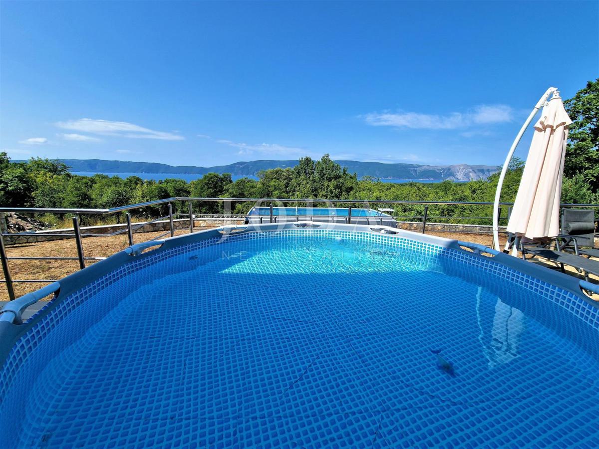 Appartamento al piano terra con vista mare