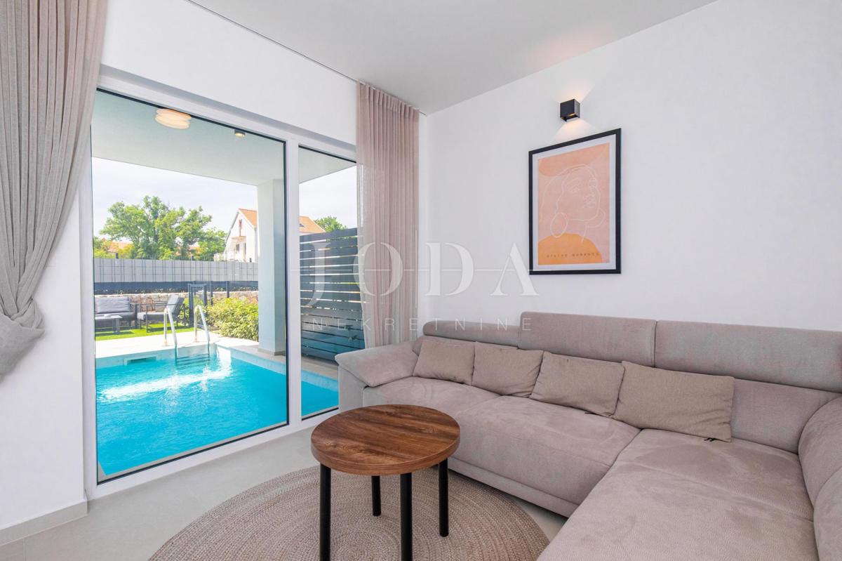 Appartamento con piscina e giardino