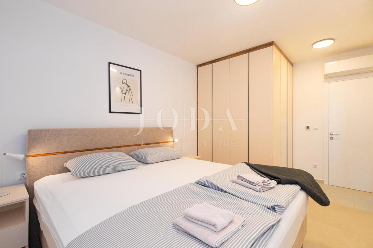 Appartamento con piscina e giardino