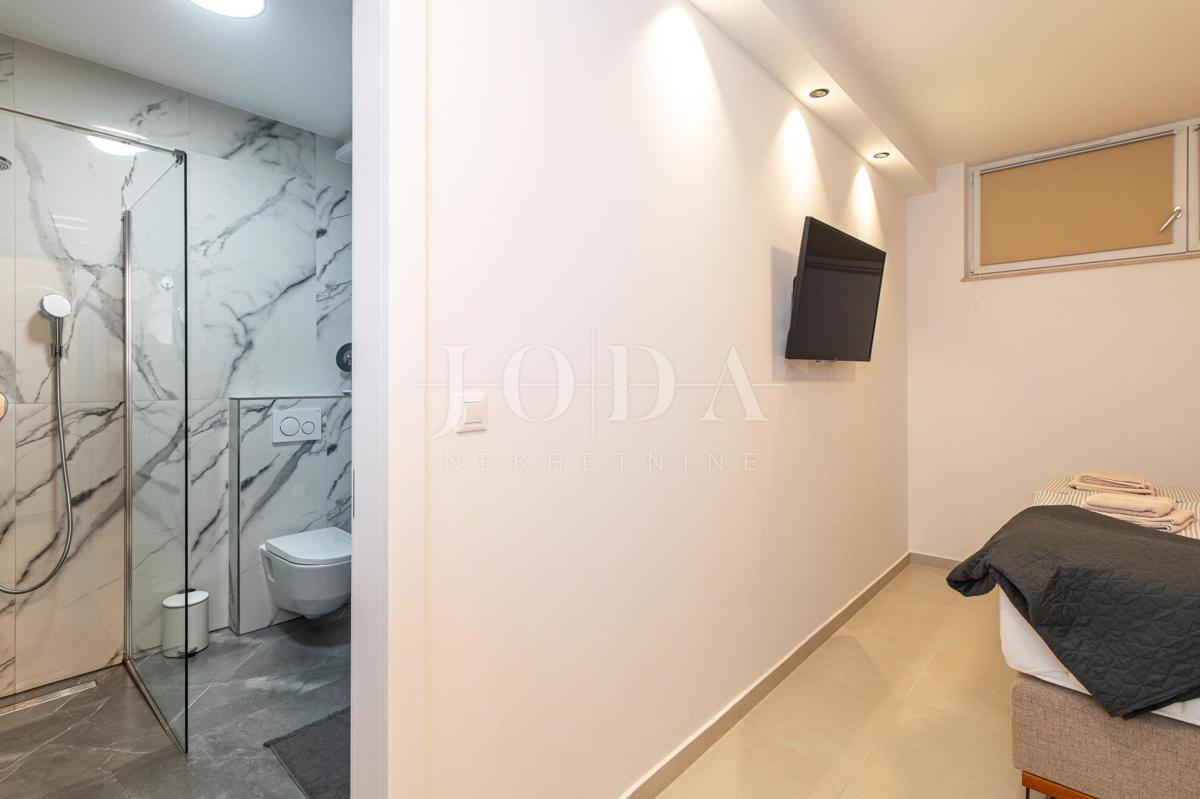 Appartamento con piscina e giardino