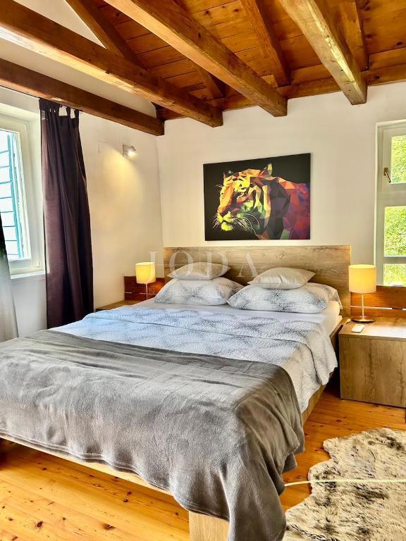 Grižane – Proprietà con due case in pietra e terreno