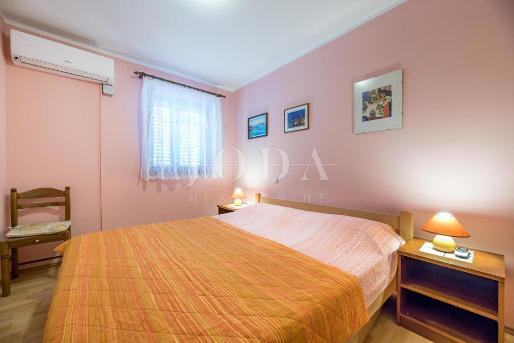 Ampio appartamento al piano terra con giardino curato