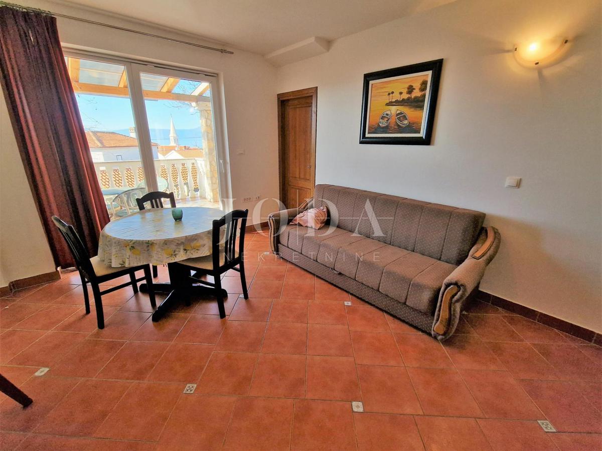 House in a row with two apartments - near Malinska, island of Krk