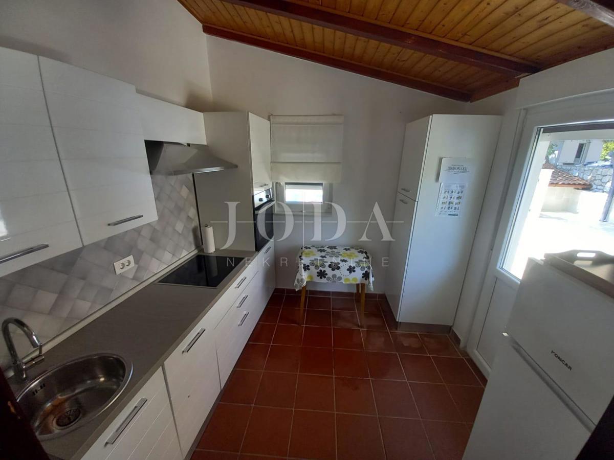 Nice semi-detached house with a pool, near the town of Krk