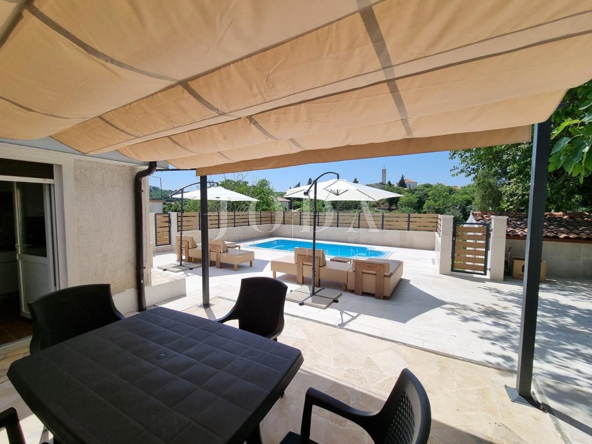 Nice semi-detached house with a pool, near the town of Krk