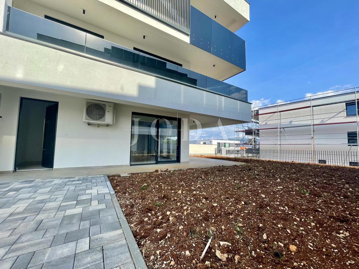 Modern apartment with garden, new building