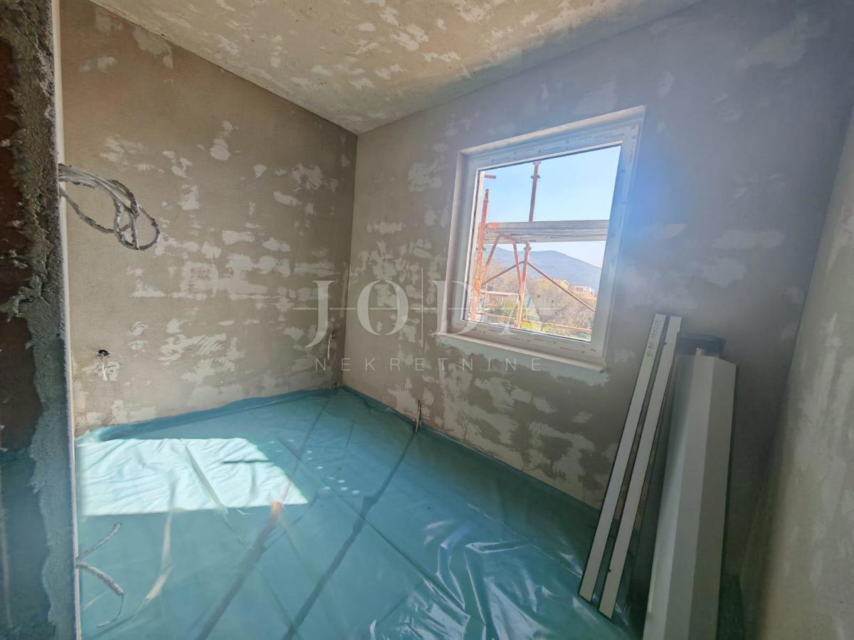 Appartamento in un edificio nuovo con vista mare