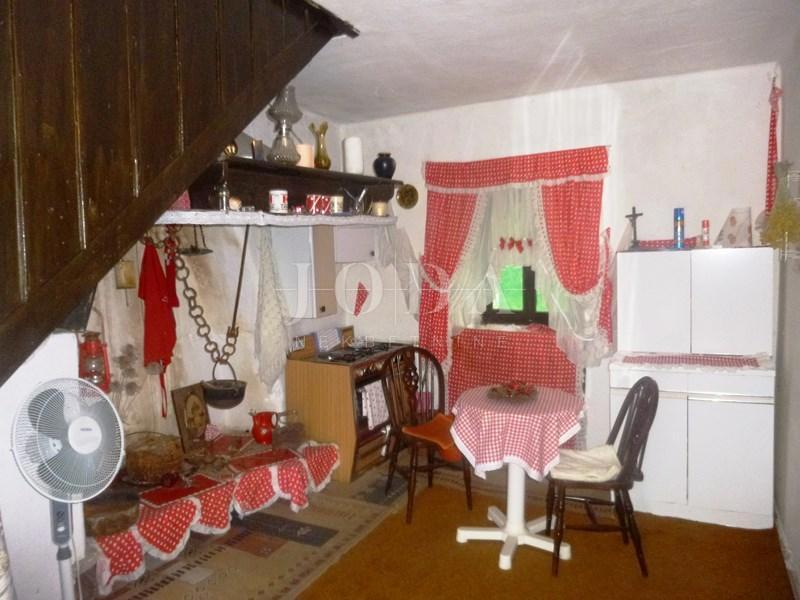 Semi-detached stone house, partially renovated