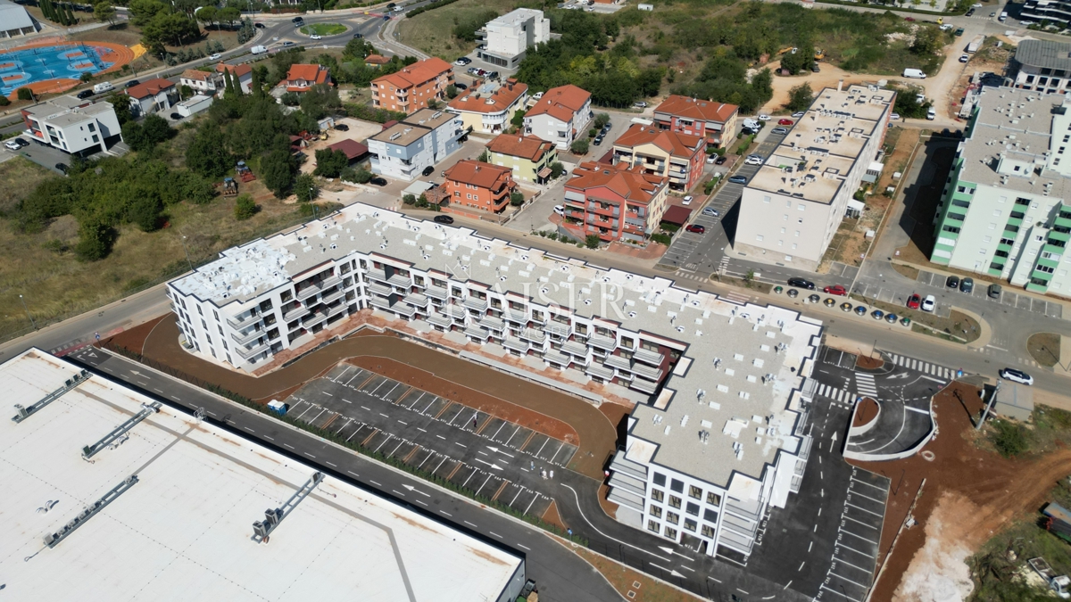Istria, Umago - appartamento con una camera da letto in una nuova costruzione, 46m2, posizione attraente