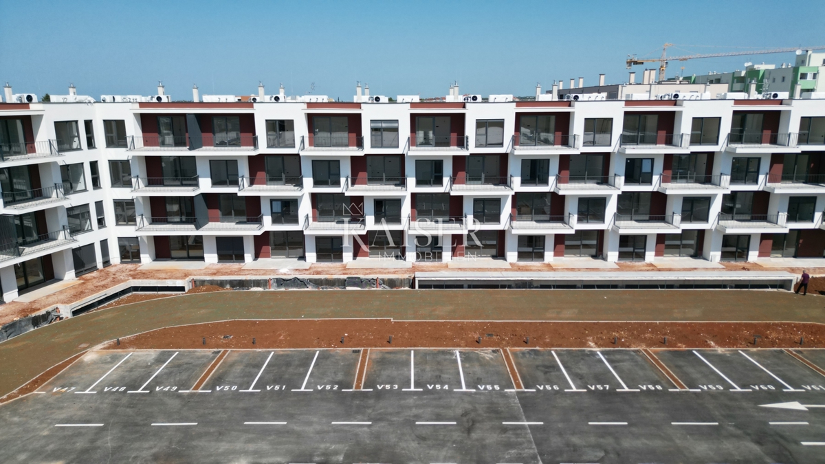 Istria, Umago - appartamento con una camera da letto in una nuova costruzione, 46m2, posizione attraente