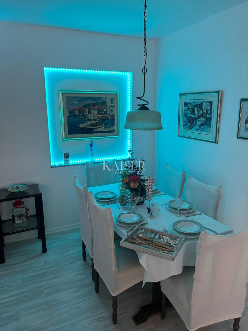 Malinska, appartamento con giardino e posto auto 