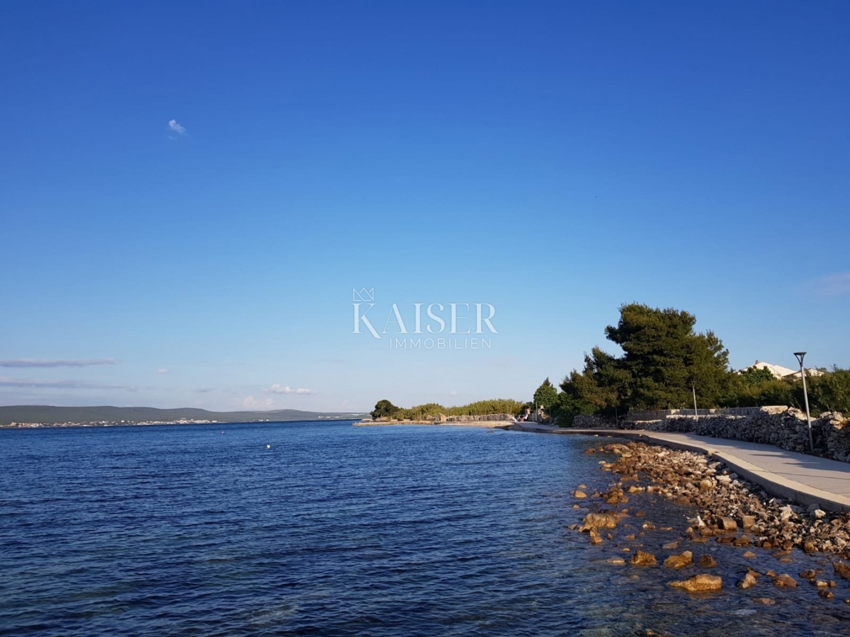 Otoki Pašman, Dobropoljana: Casa bifamiliare 1a fila dal mare