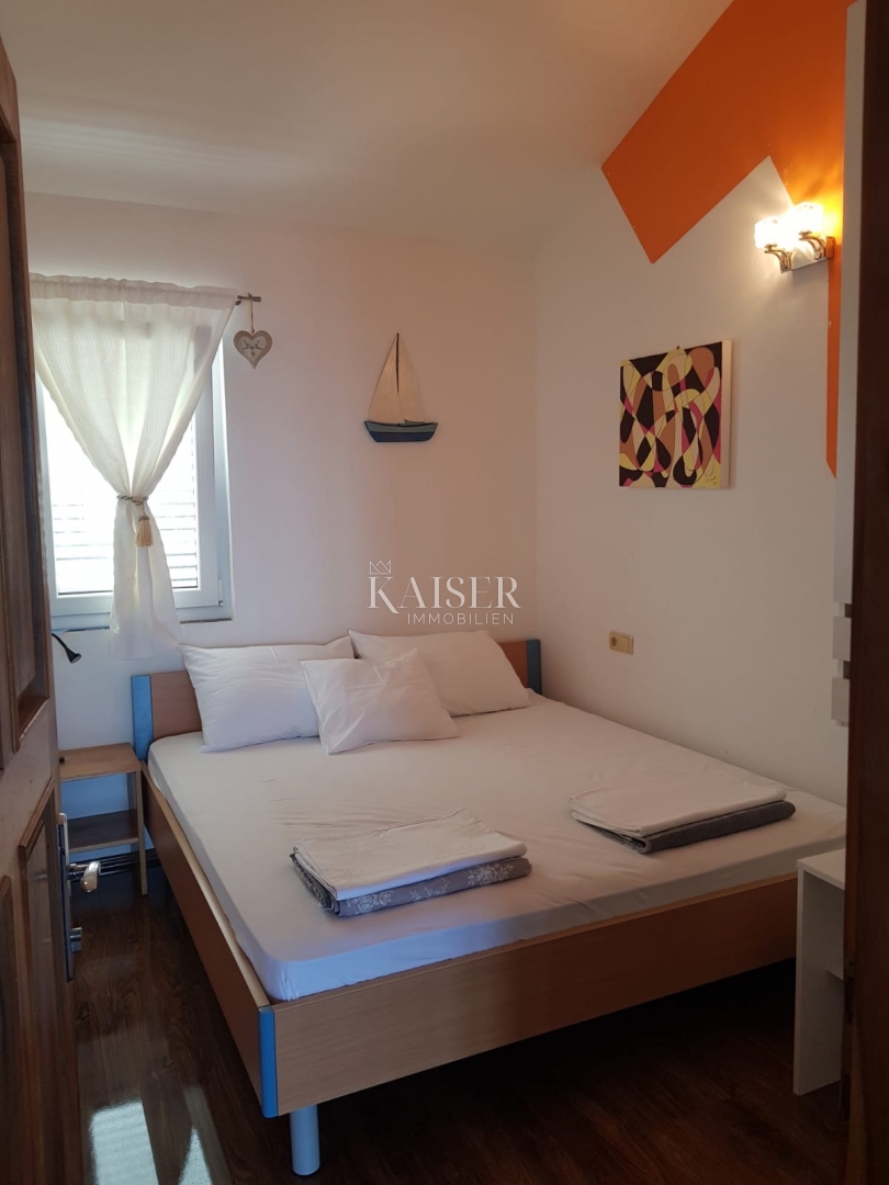 Otoki Pašman, Dobropoljana: Casa bifamiliare 1a fila dal mare