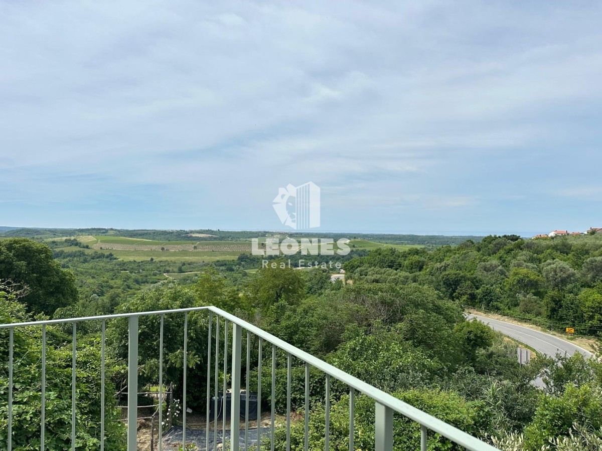 Una casa rustica unica con una splendida vista sul mare a Buie