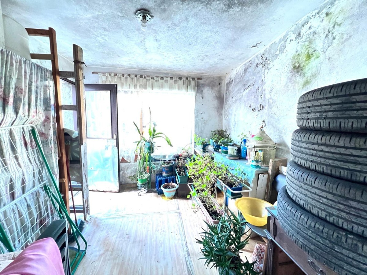 Una casa con cortile nel pieno centro di Buja
