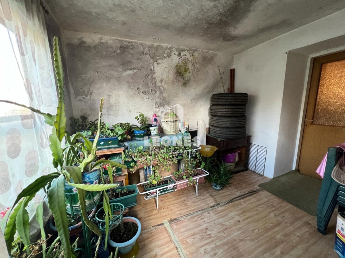 Una casa con cortile nel pieno centro di Buja