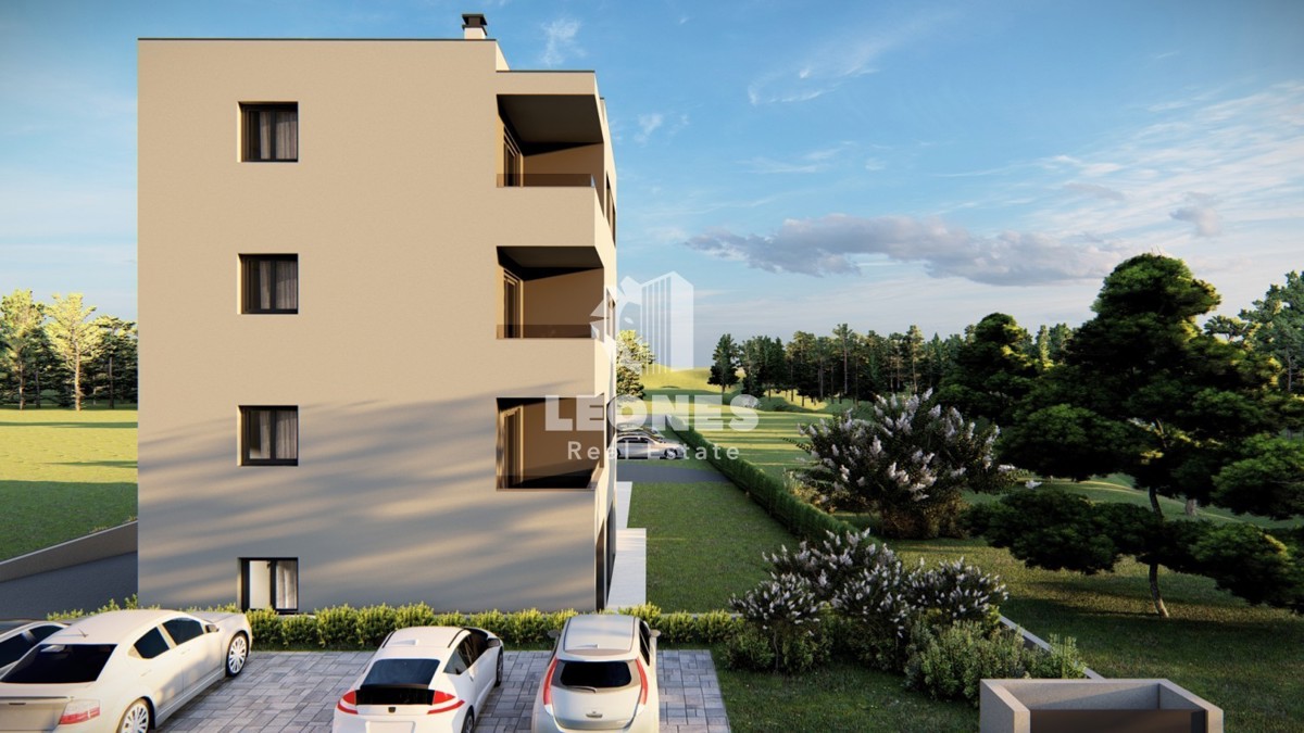 Appartamento in un nuovo edificio con ascensore a Tar in una buona posizione con una camera da letto e due posti auto