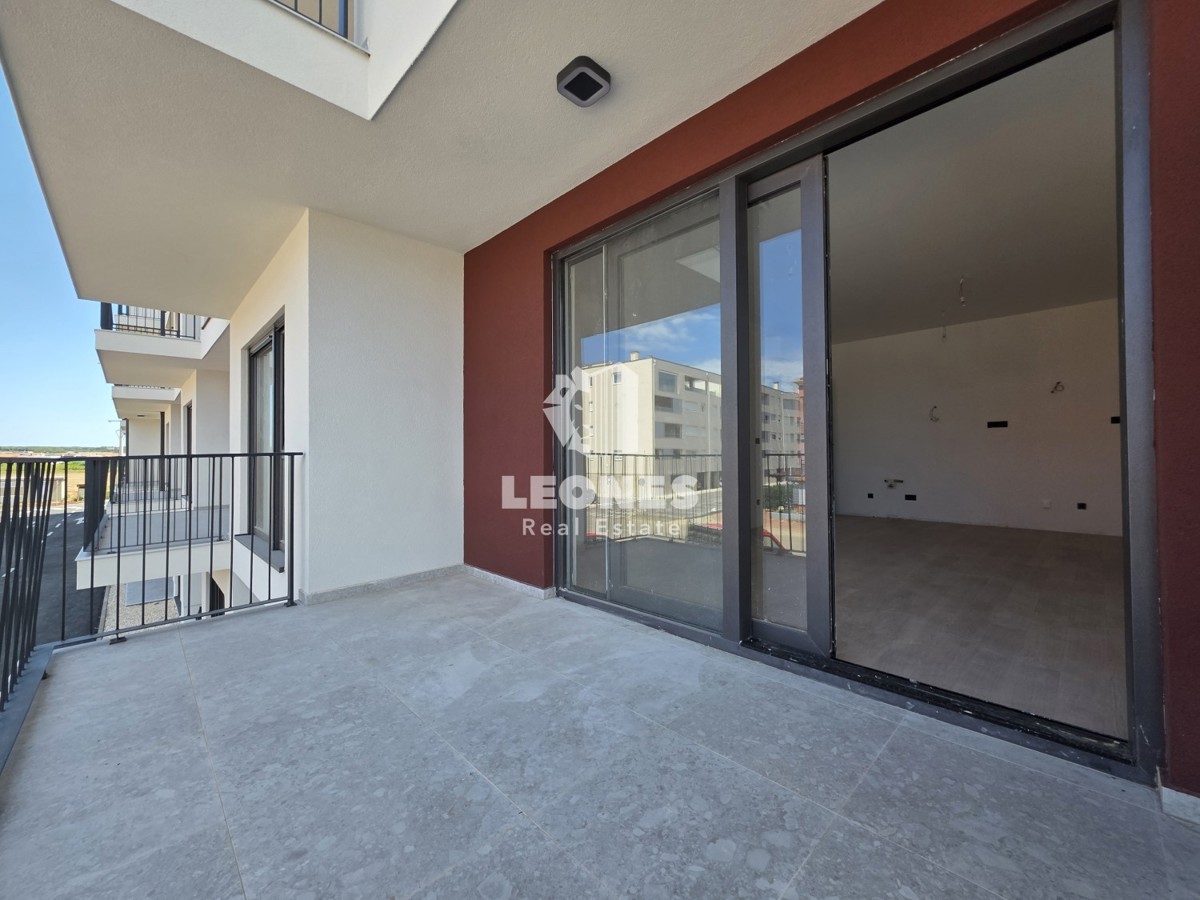 Appartamento di qualità al primo piano in un nuovo edificio a Umag - Umago