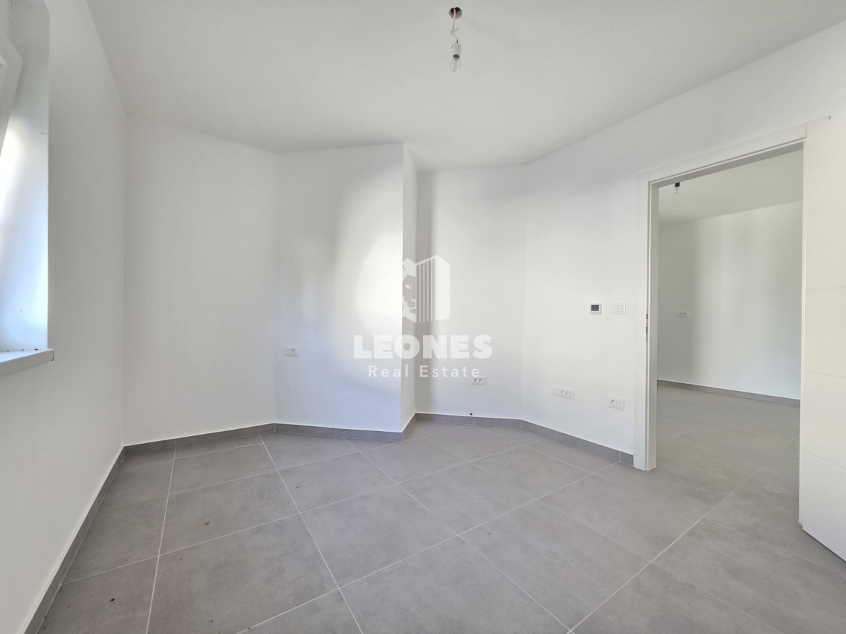 Appartamento con giardino e posto auto in garage vicino a Umago, Salvore