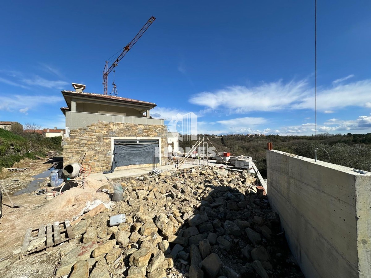 Incantevole casa in pietra con vista sul mare e piscina a sfioro nelle vicinanze di Buie