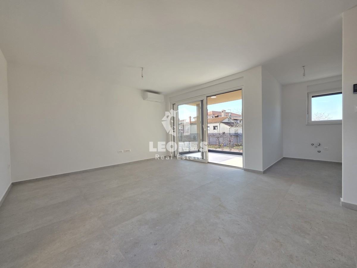 Appartamento con giardino in un edificio di nuova costruzione di qualità a Vabriga, vicino a Poreč - Parenzo