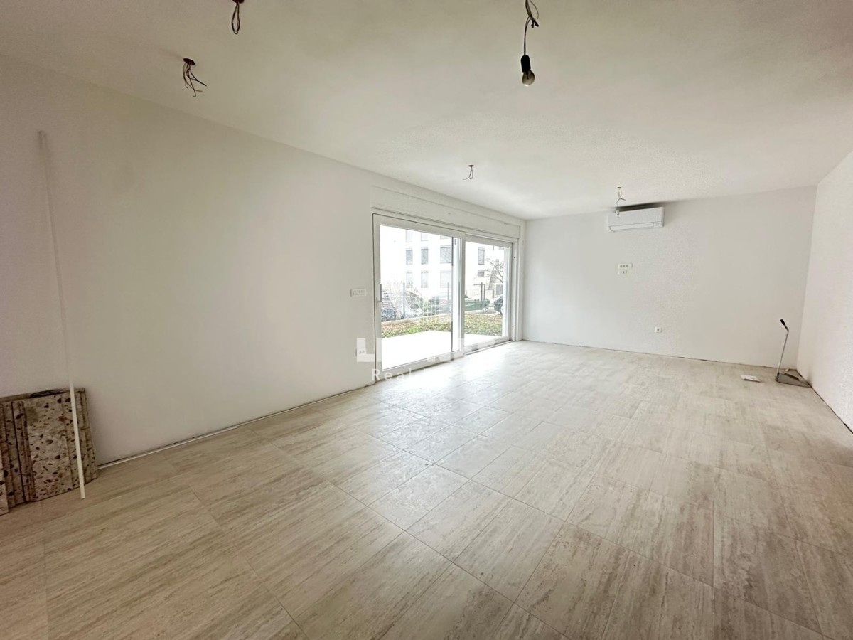 Appartamento in una nuova costruzione con cortile a Cittanova