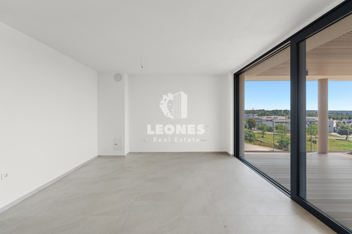 Appartamento al primo piano in lussuosa palazzina di nuova costruzione dotata di ascensore e vista mare