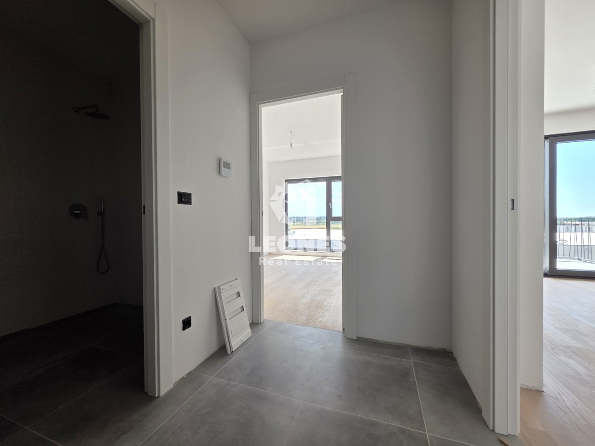 Appartamento al terzo piano di un edificio di nuova costruzione di qualità a Umag - Umago