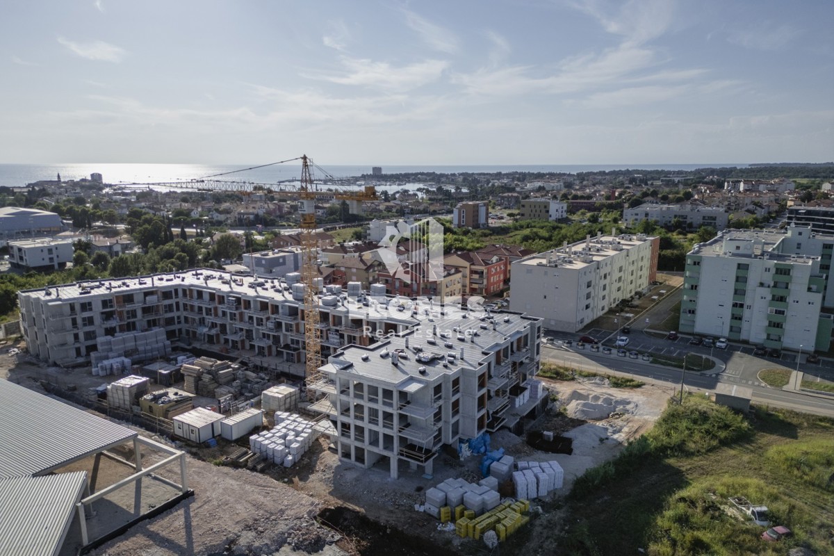 Appartamento di qualità con giardino in un nuovo edificio vicino a tutti i servizi a Umag - Umago