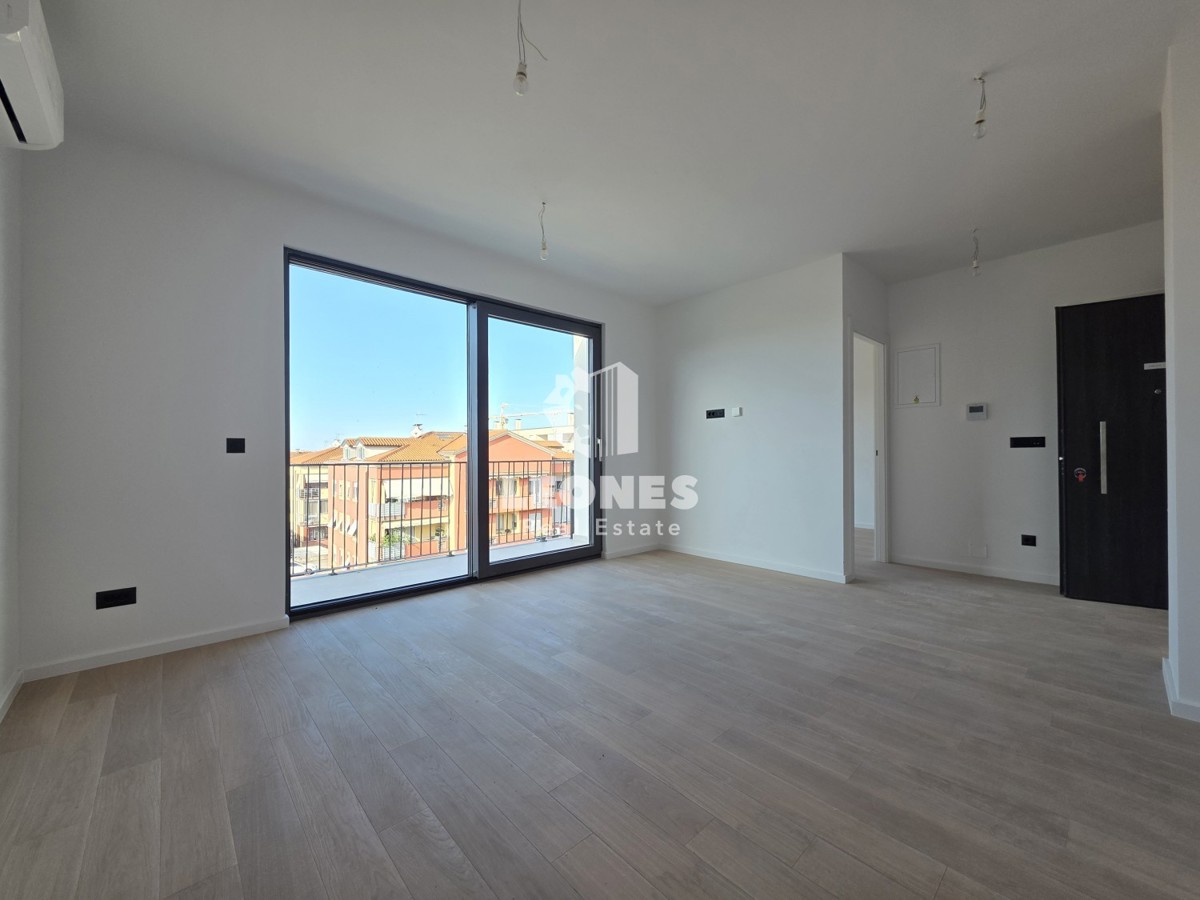 Appartamento con ascensore in un edificio di nuova costruzione di qualità a Umag - Umago