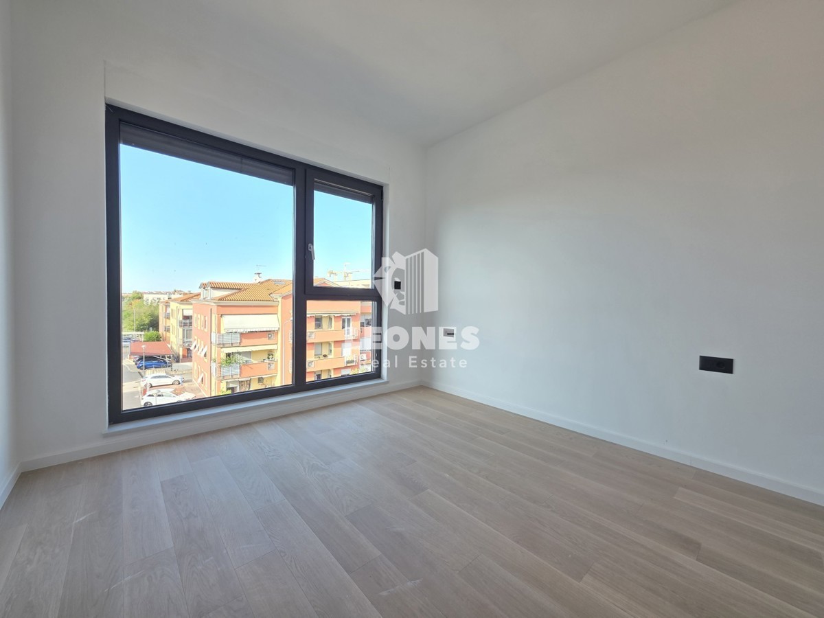 Appartamento con ascensore in un edificio di nuova costruzione di qualità a Umag - Umago