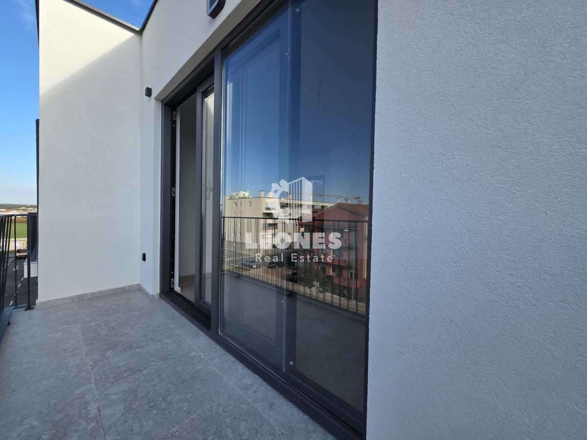 Appartamento con ascensore in un edificio di nuova costruzione di qualità a Umag - Umago