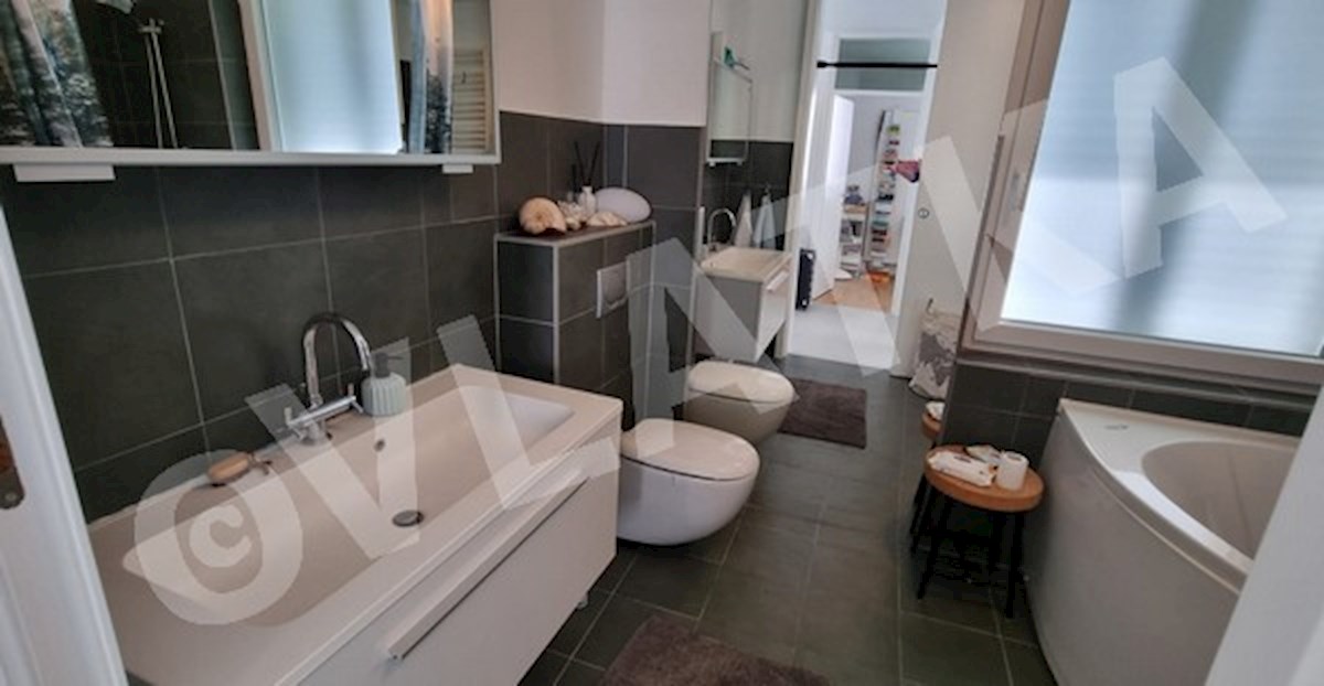 CASA UNIFAMILIARE NELLA NATURA CON GIARDINO E GARAGE